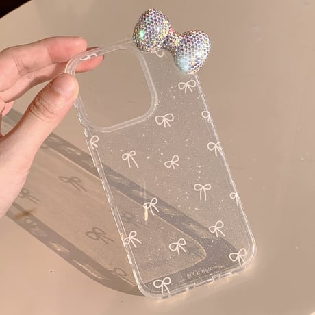 リボン iPhone16/16Proケース ダイヤリボン ラメ入り iPhone15Pro/14/13Proカバー キラキラ めっちゃ可愛い 高級感 [M4690]