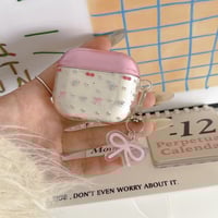 Pink clear ribbon strap airpodsケース