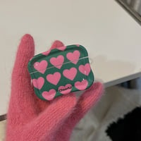 Pink heart green airpodsケース