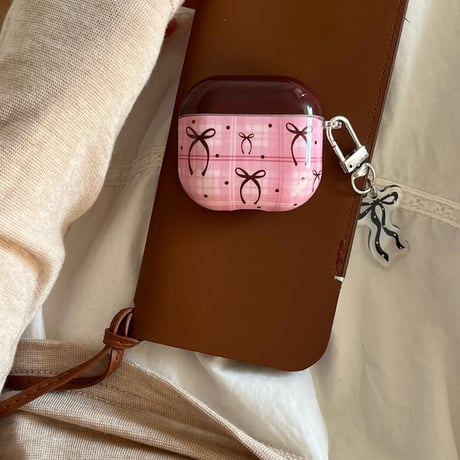 Pink check ribbon strap airpodsケース
