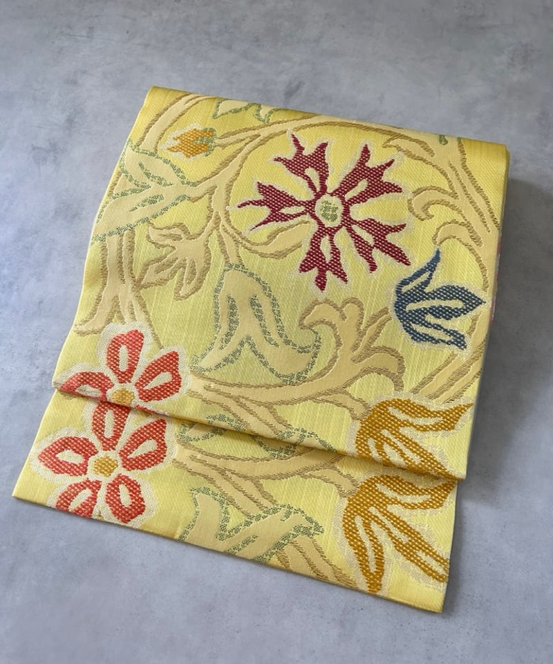 未使用】帯屋捨松八寸名古屋帯 包み込む 蝶模様 黄色 未使用】帯屋捨松八寸名古屋帯 包み込む 蝶模様 黄色