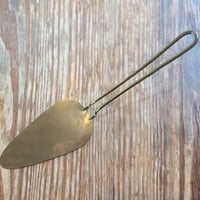 Lue, Pizza scoop
