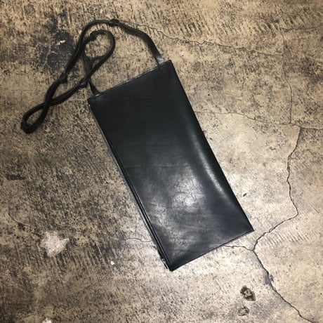 TANGLED STRAP CLUTCH BAG