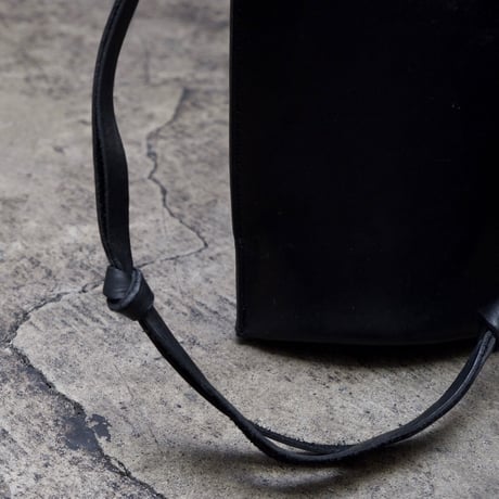 TANGLED STRAP SHOULDER BAG