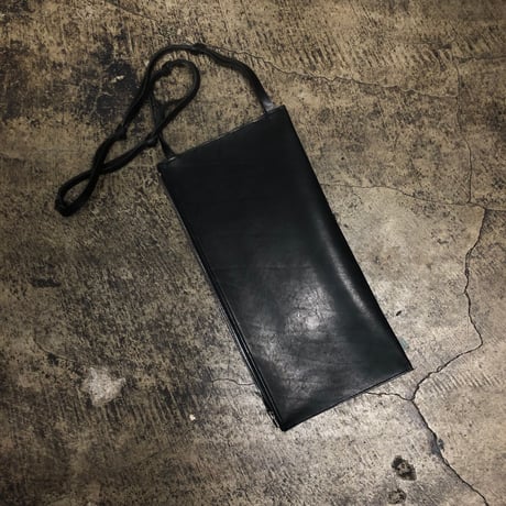 TANGLED STRAP CLUTCH BAG