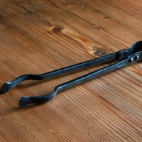 tongs R
