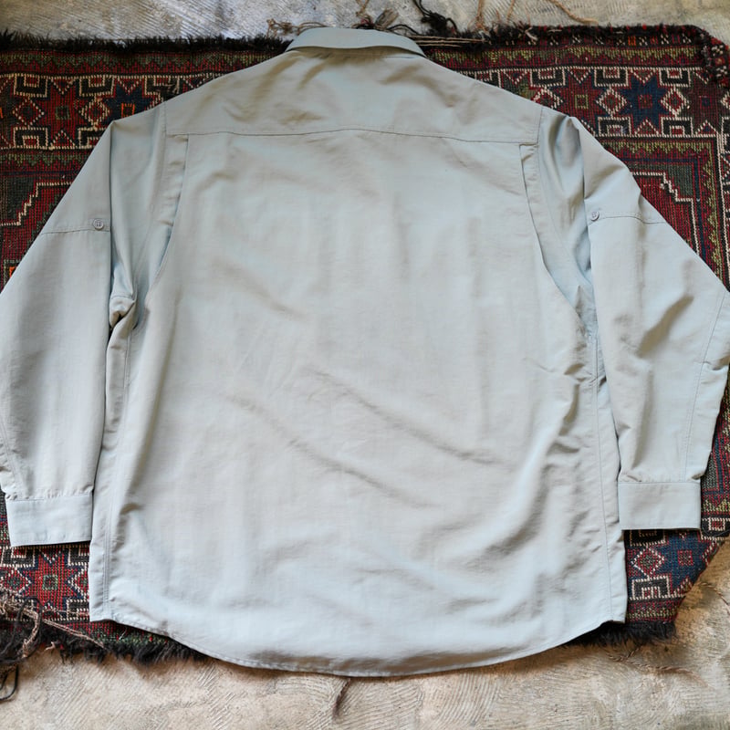 SQUEEZED DESIGN SUPPLEX NYLON ACTIVE SHIRT | UN