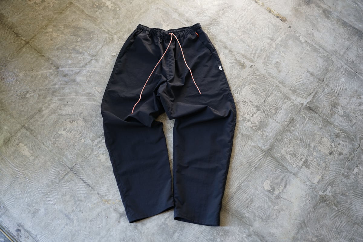 UNSLACKS ACTIVE EASY PANTS マンゴー UNSLACKS ACTIVE EASY PANTS マンゴー