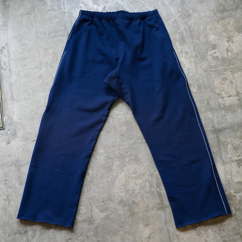 SQUEEZED DESIGN SIDE REFLECTOR SWEAT PANTS | UN