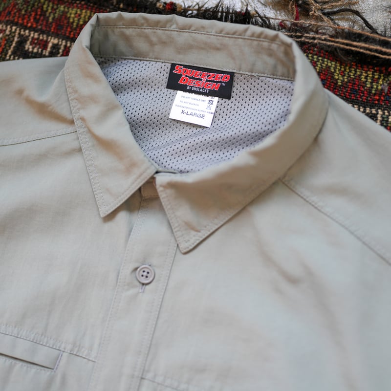 SQUEEZED DESIGN SUPPLEX NYLON ACTIVE SHIRT | UN