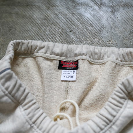 SQUEEZED DESIGN SIDE REFLECTOR SWEAT PANTS