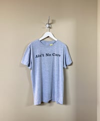 【USED】 “Ain’t No Cure” プリントTシャツ (ユニセックス)