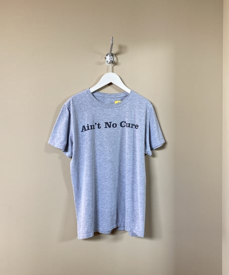 【USED】 “Ain’t No Cure” プリントTシャツ (ユニセックス)