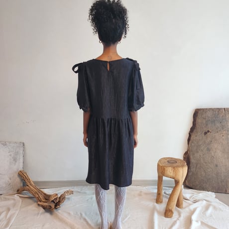 Shirred puff-sleeve dress.