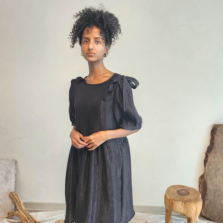 Shirred puff-sleeve dress.