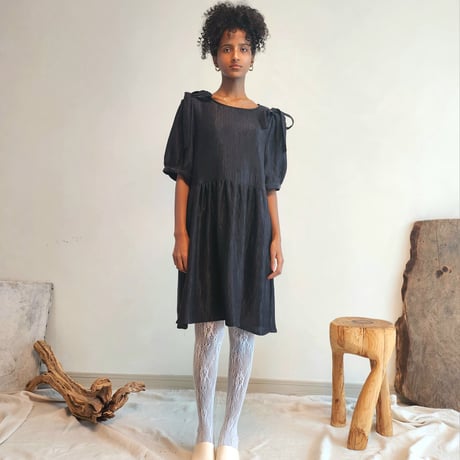 Shirred puff-sleeve dress.
