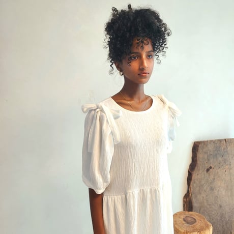 Shirred puff-sleeve dress.