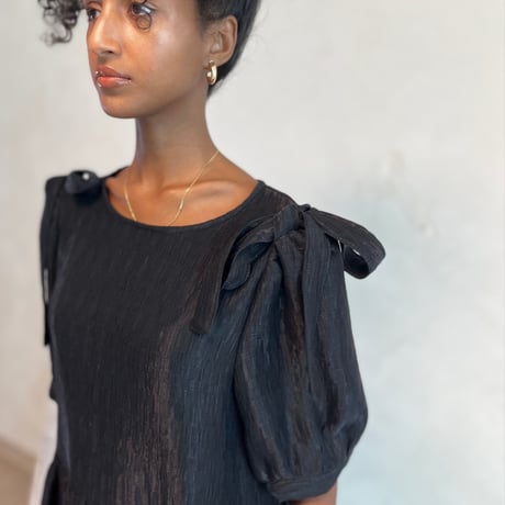 Shirred puff-sleeve dress.