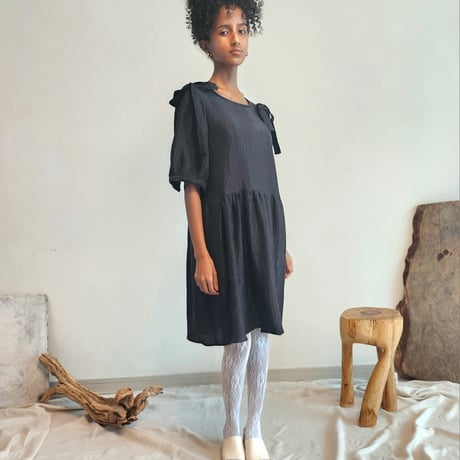 Shirred puff-sleeve dress.