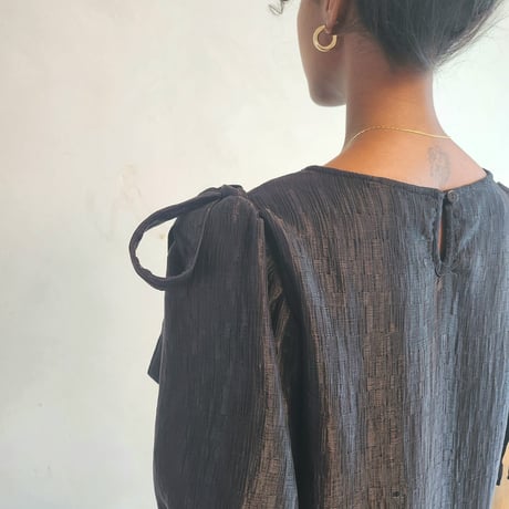 Shirred puff-sleeve dress.