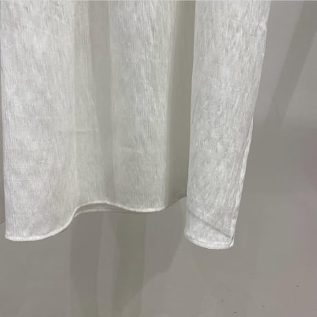 Shirred puff-sleeve dress.