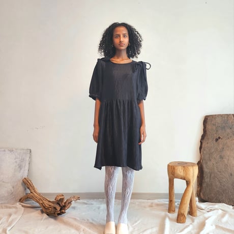 Shirred puff-sleeve dress.