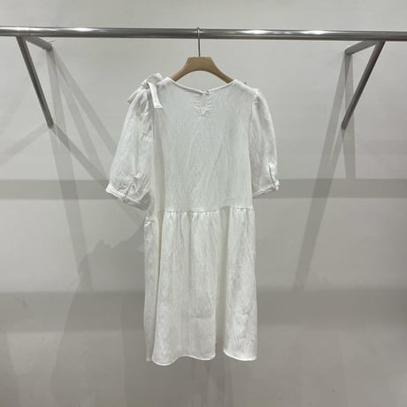 Shirred puff-sleeve dress.