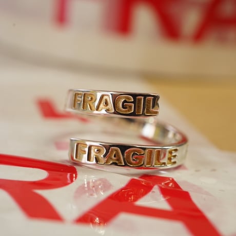 IN-PUT-OUT / "Fragile" Ring