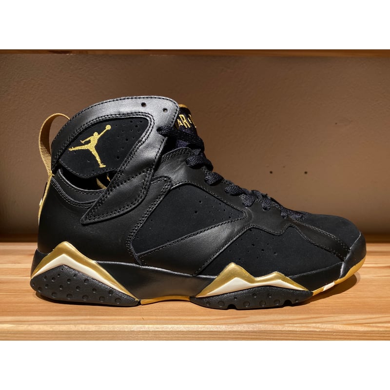 Air jordan 7 black and gold sales