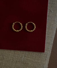 dot m pierce gold