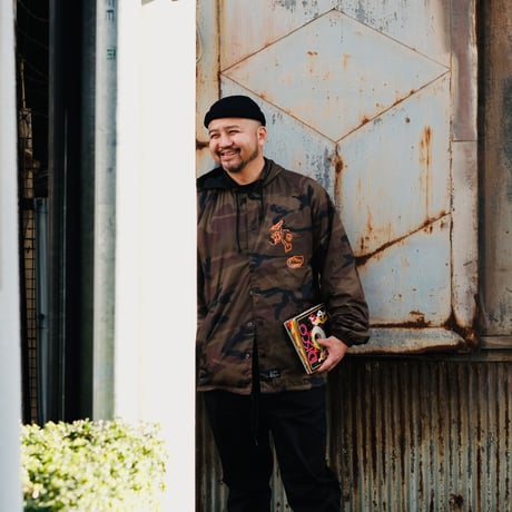 VINYL JUNKIE - Rhythm Of Resistance &mo Hooded Coach Jacket / CAMO