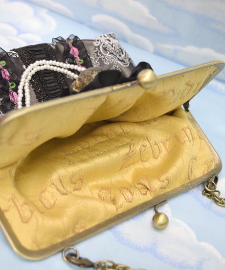kki.2086　レースと髑髏のがま口クラッチBAG。