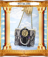 kki.2086　レースと髑髏のがま口クラッチBAG。