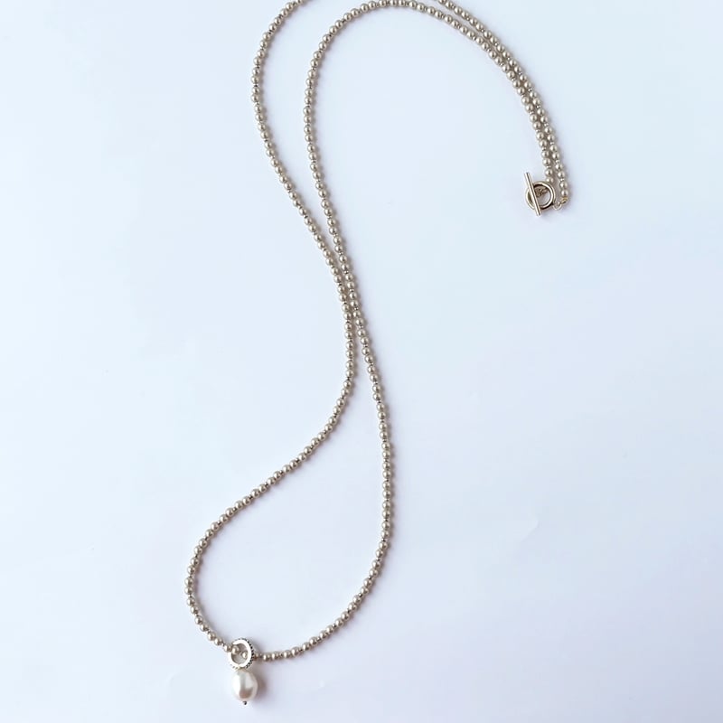 チャーム付シェルパールのロングネックレス | CO＊STARRING ONLINE-SHOP