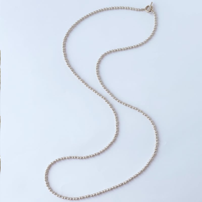チャーム付シェルパールのロングネックレス | CO＊STARRING ONLINE-SHOP