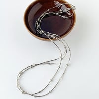 パーツミックスのロングネックレス