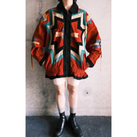 colorful leather designed jacket with concho