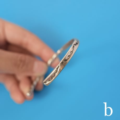navajo "Elaine Tahe" twist × stamp work bangle
