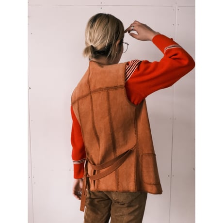 leather × crochet vest
