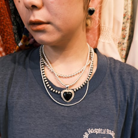 navajo / heart motif onyx pierce