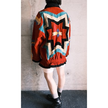 colorful leather designed jacket with concho