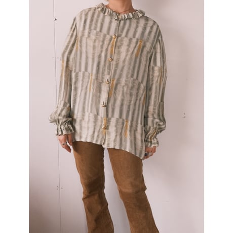 frill blouse with gold buttons