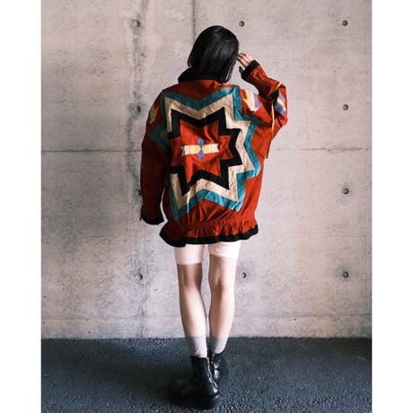 colorful leather designed jacket with concho