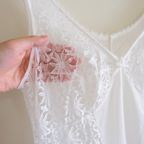 White flower designed lingerie with lace and ribbon
