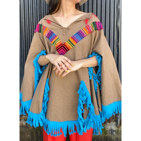 fringe poncho with animal