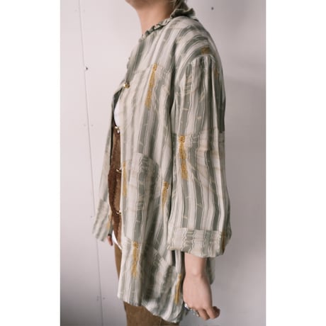 frill blouse with gold buttons
