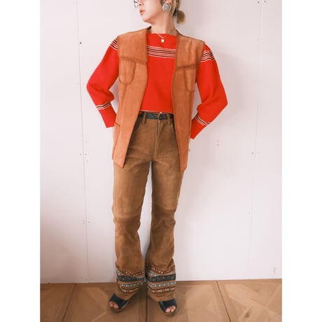 leather × crochet vest