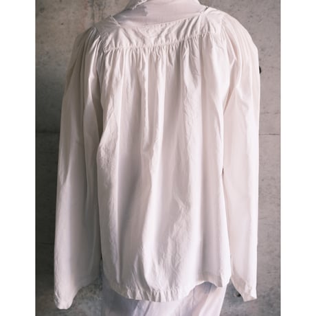 antique smock with smily hairpins