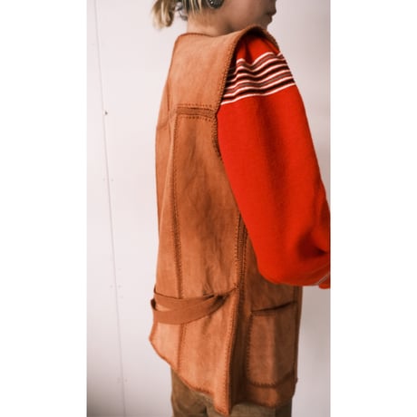 leather × crochet vest