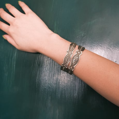 navajo "Arnold Blackgoat" / stamp work bangle